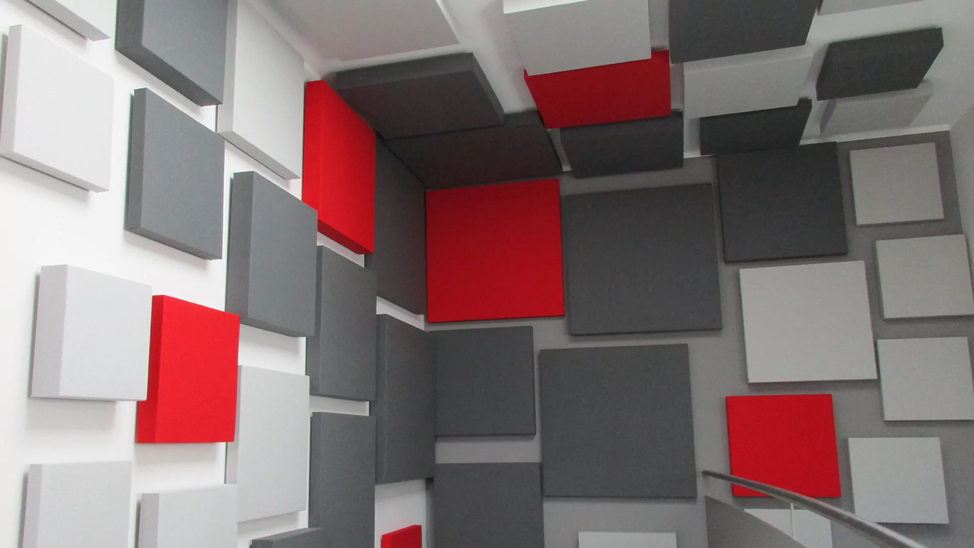 Many wall absorbers in different heights Acoustic absorber wall with fabric cover